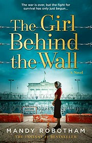The girl behind the wall : a novel